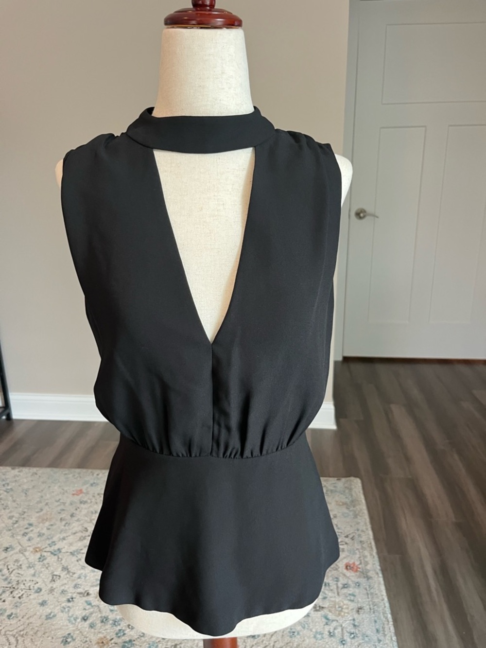Chic Black Sleeveless V-Neck Peplum Top  -
